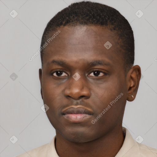 Neutral black young-adult male with short  brown hair and brown eyes