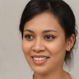 Joyful white young-adult female with medium  brown hair and brown eyes