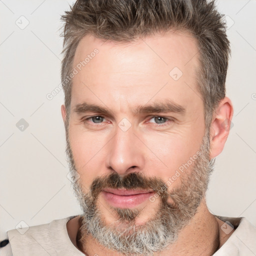 Neutral white adult male with short  brown hair and brown eyes