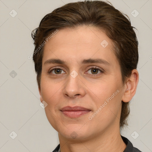 Joyful white adult female with short  brown hair and brown eyes