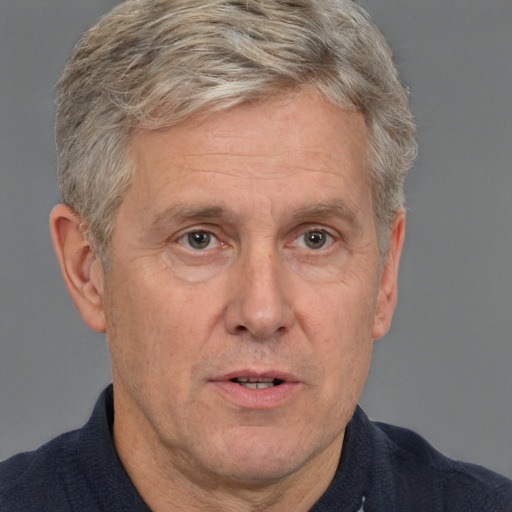 Neutral white middle-aged male with short  brown hair and brown eyes