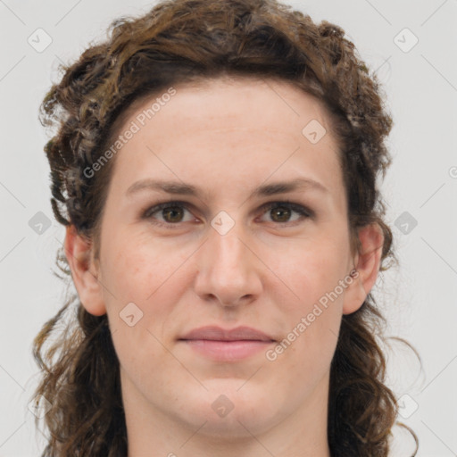 Joyful white young-adult female with long  brown hair and green eyes