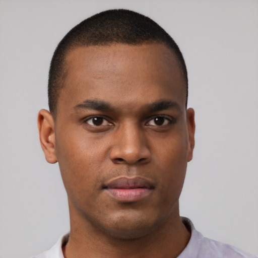 Neutral black young-adult male with short  brown hair and brown eyes