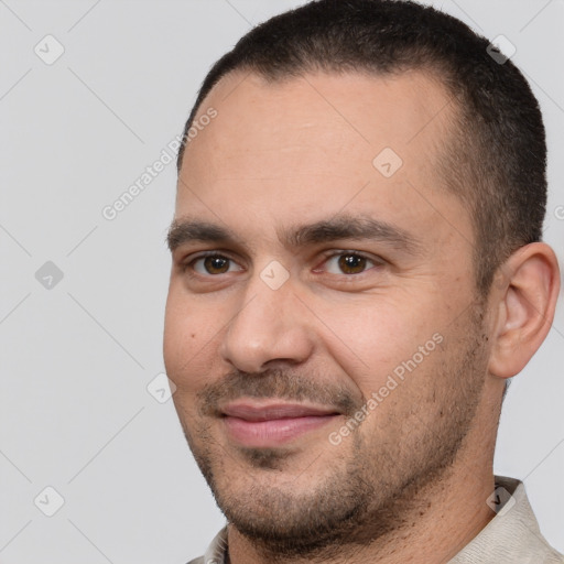 Joyful white young-adult male with short  brown hair and brown eyes