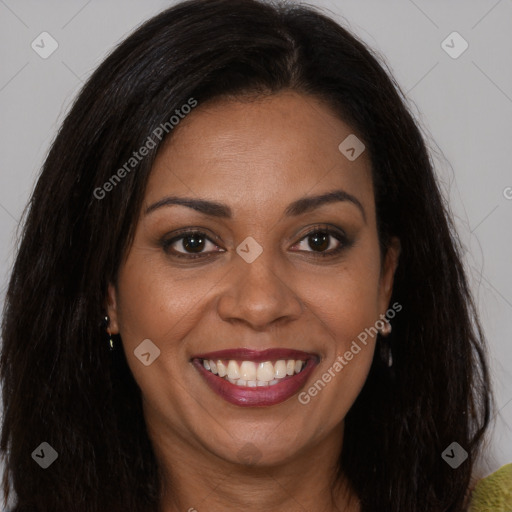 Joyful latino young-adult female with long  brown hair and brown eyes