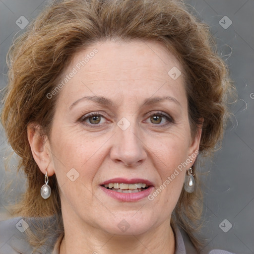 Joyful white adult female with medium  brown hair and grey eyes