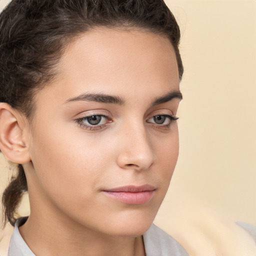 Neutral white young-adult female with short  brown hair and brown eyes