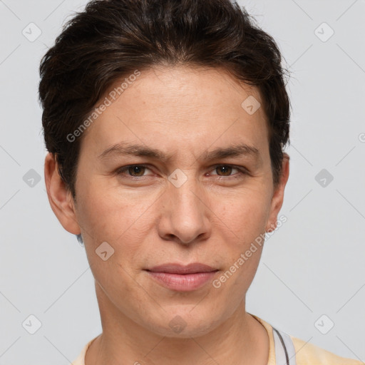 Joyful white adult female with short  brown hair and brown eyes