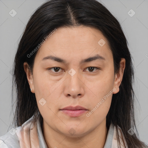 Neutral asian adult female with medium  brown hair and brown eyes