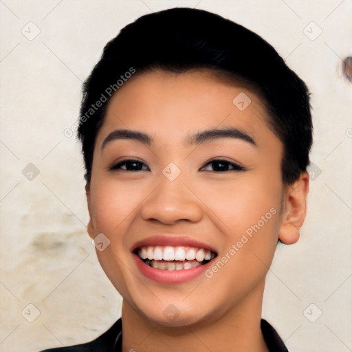 Joyful latino young-adult female with short  black hair and brown eyes