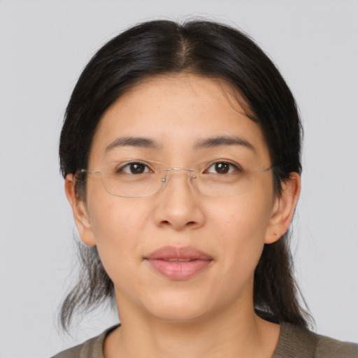 Neutral asian young-adult female with medium  brown hair and brown eyes