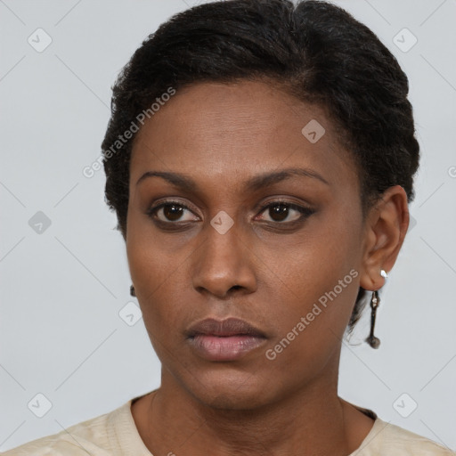 Neutral black young-adult female with short  brown hair and brown eyes