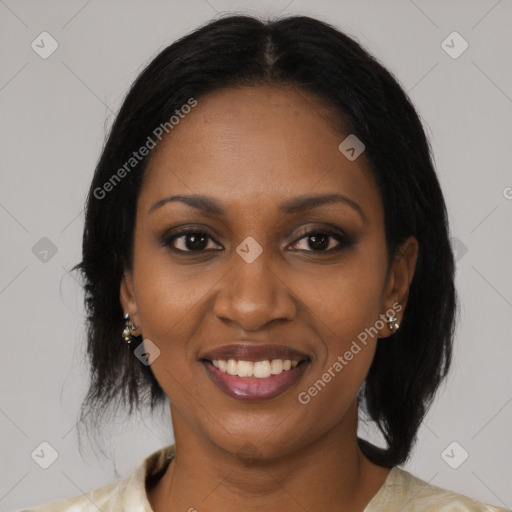 Joyful black young-adult female with medium  brown hair and brown eyes