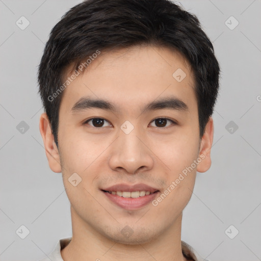 Joyful white young-adult male with short  black hair and brown eyes