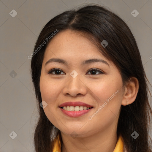 Joyful asian young-adult female with long  brown hair and brown eyes