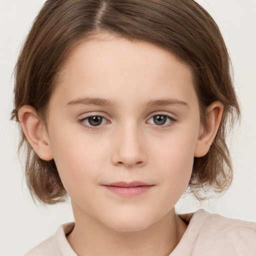 Joyful white child female with medium  brown hair and brown eyes