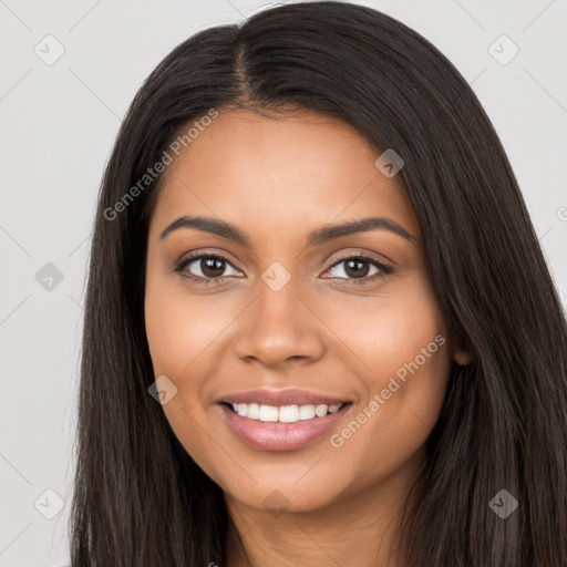 Joyful latino young-adult female with long  brown hair and brown eyes