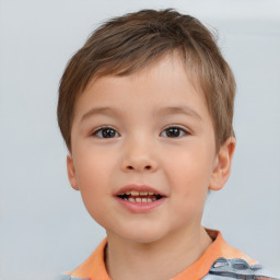 Joyful white child male with short  brown hair and brown eyes