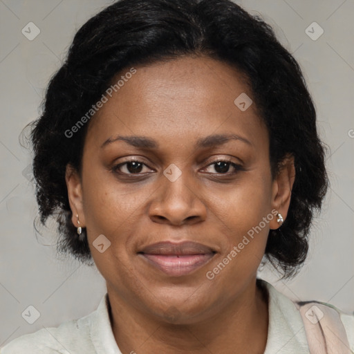 Joyful latino adult female with medium  brown hair and brown eyes