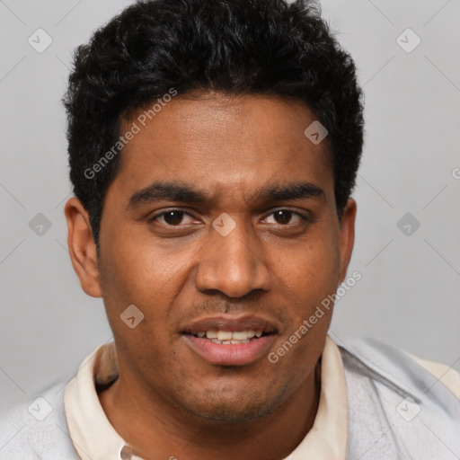 Joyful black young-adult male with short  brown hair and brown eyes