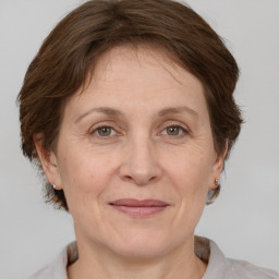 Joyful white adult female with short  brown hair and grey eyes