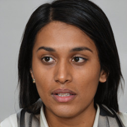 Neutral asian young-adult female with medium  black hair and brown eyes