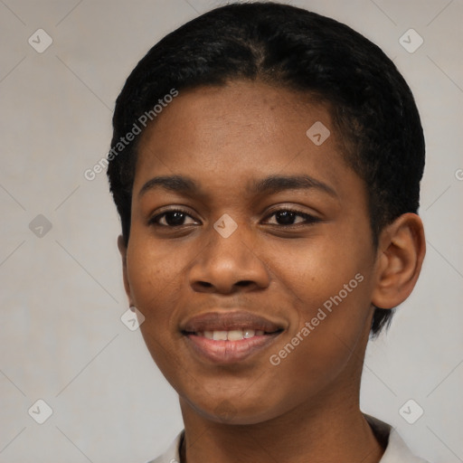 Joyful black young-adult female with short  black hair and brown eyes