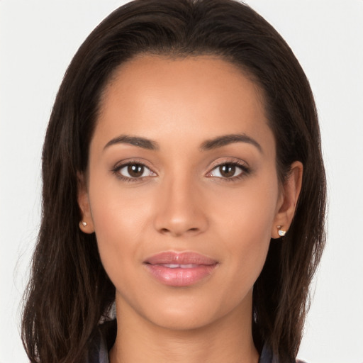 Joyful white young-adult female with long  brown hair and brown eyes