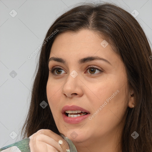 Joyful white young-adult female with medium  brown hair and brown eyes