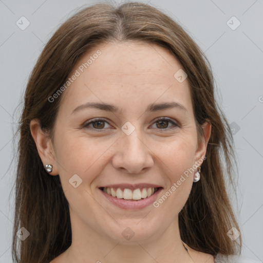 Joyful white young-adult female with long  brown hair and grey eyes