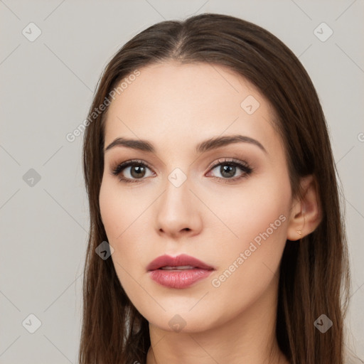 Neutral white young-adult female with long  brown hair and brown eyes