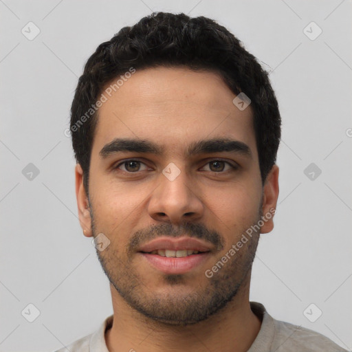 Neutral latino young-adult male with short  black hair and brown eyes