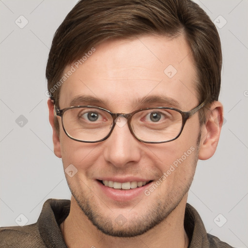 Joyful white adult male with short  brown hair and grey eyes