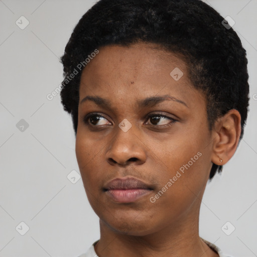 Neutral black young-adult female with short  black hair and brown eyes