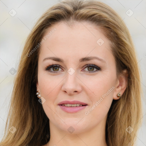 Joyful white young-adult female with long  brown hair and green eyes