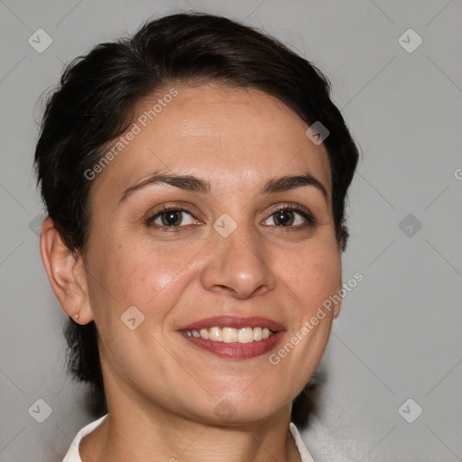 Joyful white adult female with short  brown hair and brown eyes