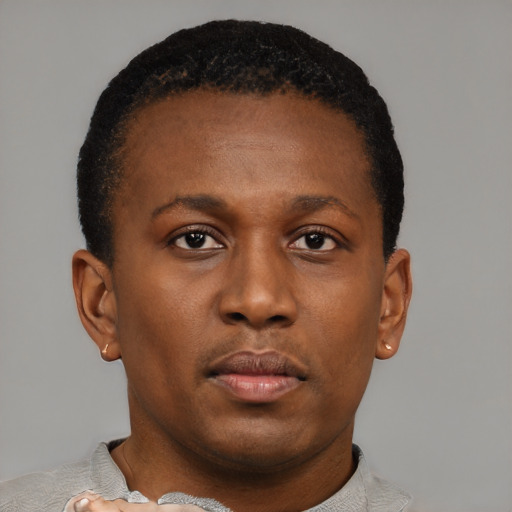 Neutral black young-adult male with short  brown hair and brown eyes