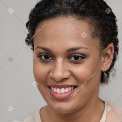 Joyful latino young-adult female with short  brown hair and brown eyes