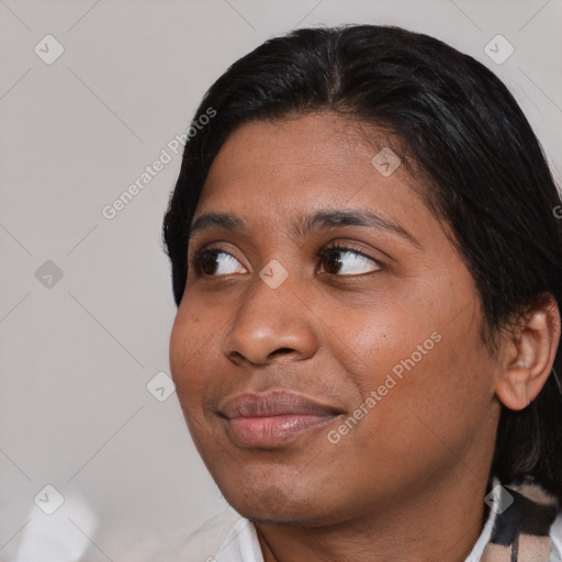 Joyful asian young-adult female with medium  black hair and brown eyes