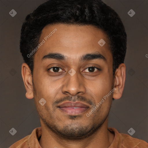 Joyful latino young-adult male with short  brown hair and brown eyes