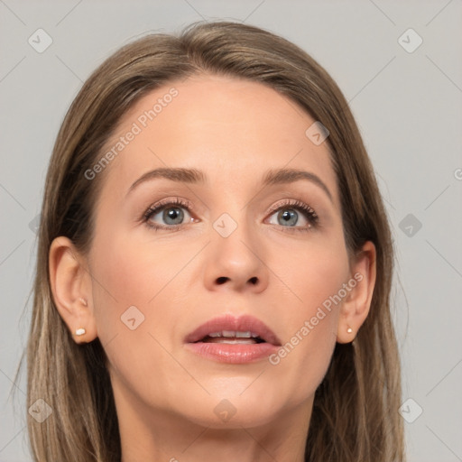 Joyful white young-adult female with long  brown hair and grey eyes