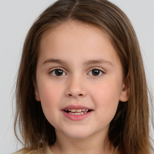 Joyful white child female with long  brown hair and brown eyes