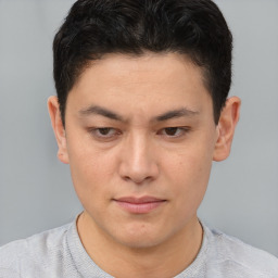 Neutral asian young-adult male with short  brown hair and brown eyes