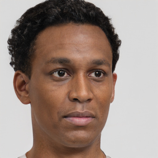 Neutral black young-adult male with short  brown hair and brown eyes