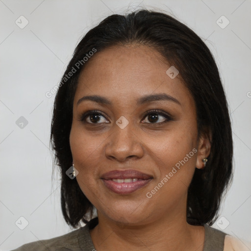 Joyful black young-adult female with medium  black hair and brown eyes