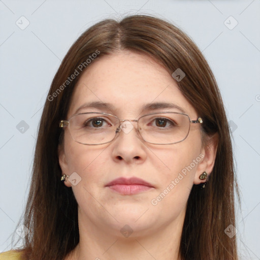 Joyful white adult female with long  brown hair and brown eyes