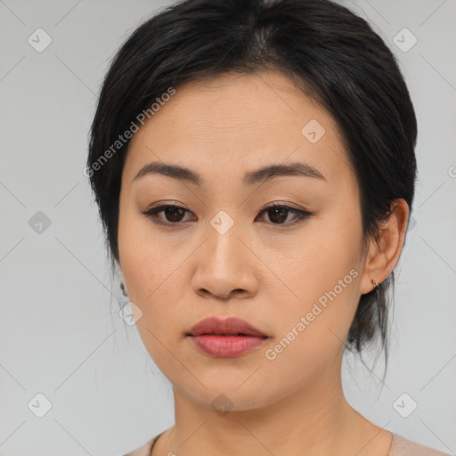 Neutral asian young-adult female with medium  black hair and brown eyes