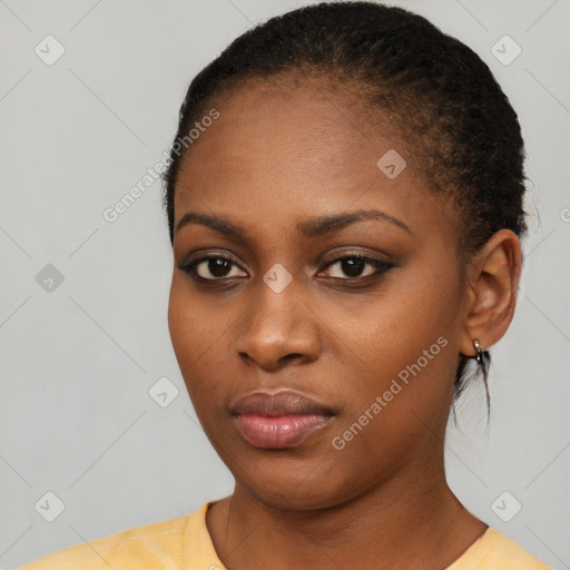 Neutral black young-adult female with short  black hair and brown eyes