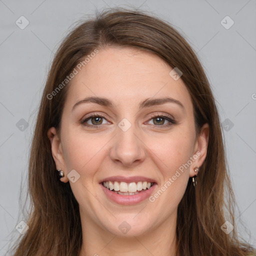 Joyful white young-adult female with long  brown hair and grey eyes