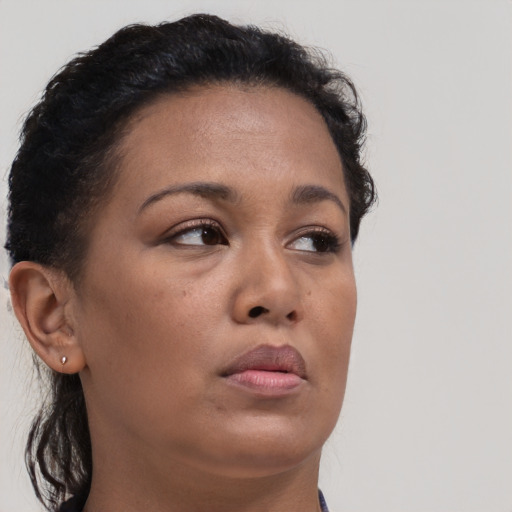 Neutral black young-adult female with short  brown hair and brown eyes